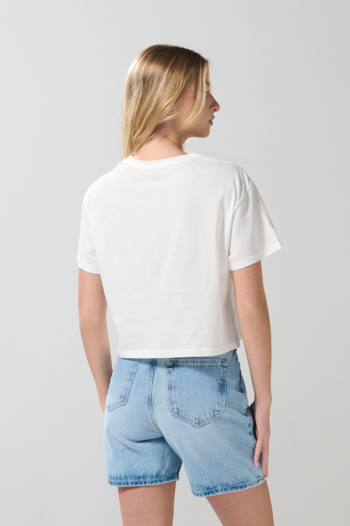 Camiseta crop top crema con diseño de Félix el Gato