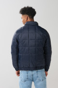 Chaqueta cuello alto acolchada unicolor con cremallera