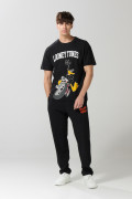 Pantalón negro tipo jogger con estampado de Looney Tunes