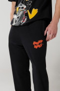 Pantalón negro tipo jogger con estampado de Looney Tunes
