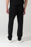 Pantalón negro tipo jogger con estampado de Looney Tunes