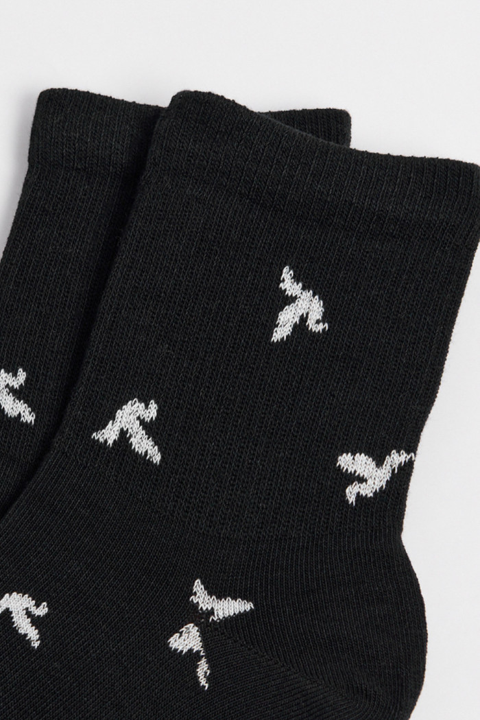 Medias cortas azules intensas con diseño de aves
