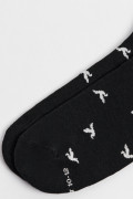 Medias cortas azules intensas con diseño de aves