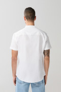 Camisa cuello nerú unicolor con botones en frente