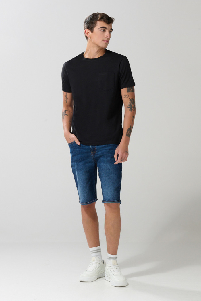 Bermuda en jean tiro bajo slim azul oscura con cremallera