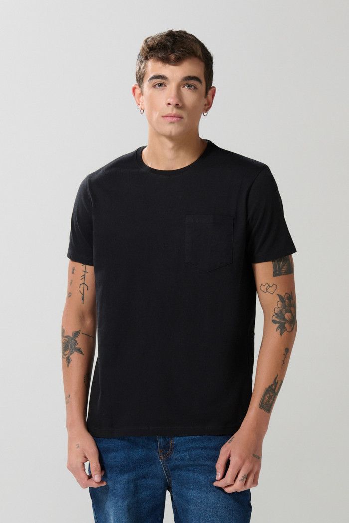 Camiseta en algodón manga corta unicolor con bolsillo