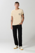 Jean slim negro con tiro bajo, fit ceñido y bolsillos
