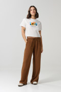 Camiseta crema clara crop top con diseño de E.T.