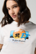 Camiseta crema clara crop top con diseño de E.T.