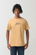 Camiseta en algodón unicolor manga corta con texto delantero