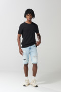 Bermuda slim azul en jean tiro bajo con rotos en frente