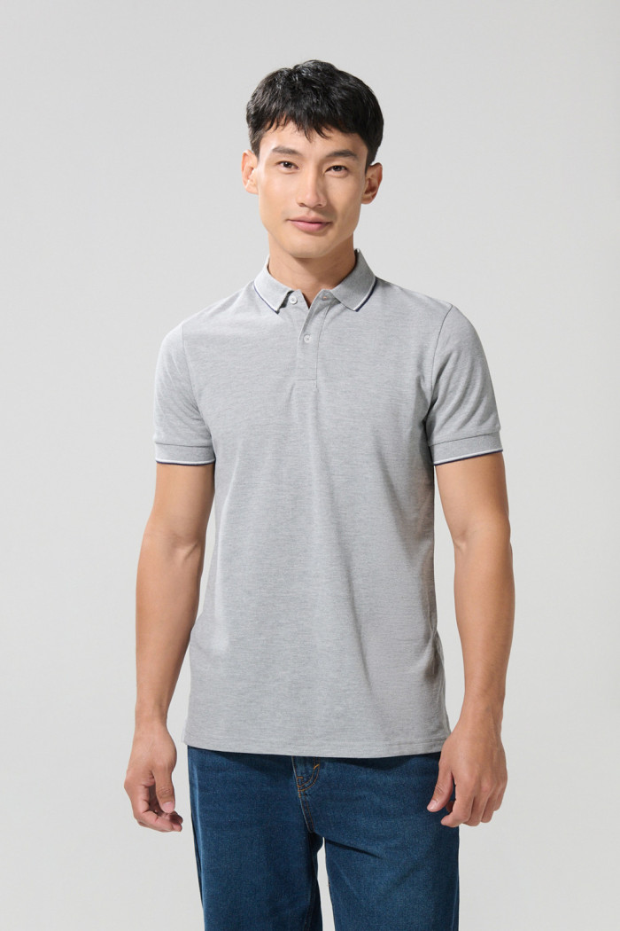 Camiseta unicolor polo manga corta con botones en pechera