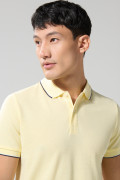 Camiseta unicolor polo manga corta con botones en pechera