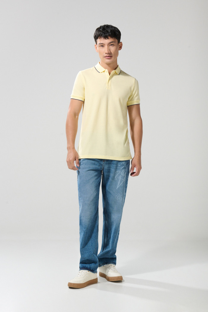 Camiseta unicolor polo manga corta con botones en pechera