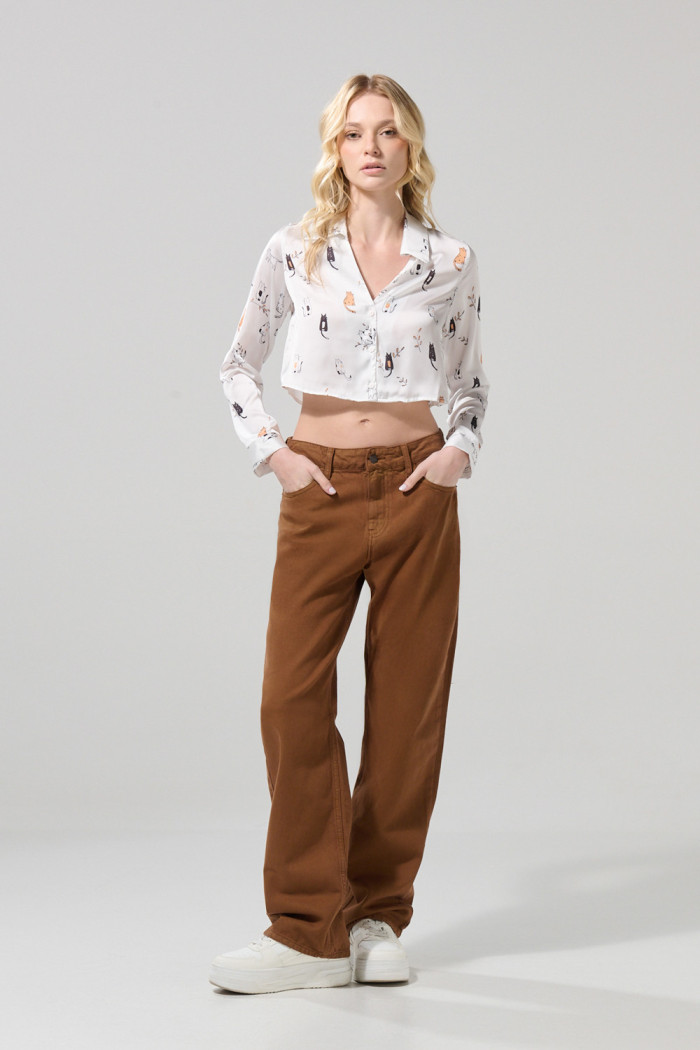 Blusa manga larga crema con diseños de gatitos