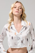 Blusa manga larga crema con diseños de gatitos