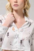 Blusa manga larga crema con diseños de gatitos
