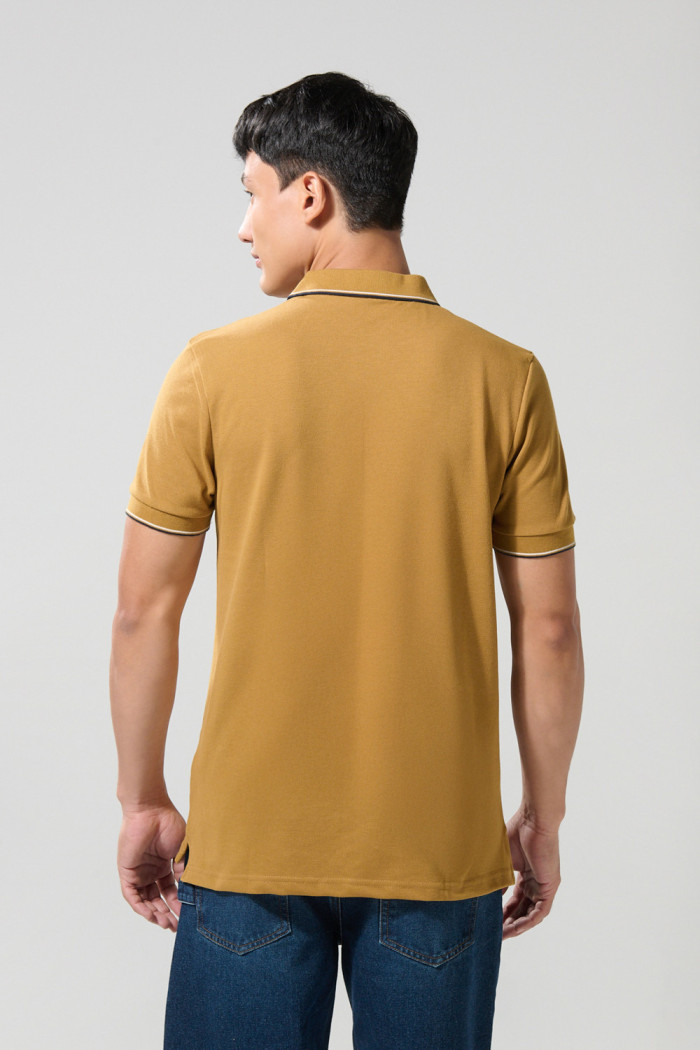 Camiseta unicolor polo con manga corta y doble botón