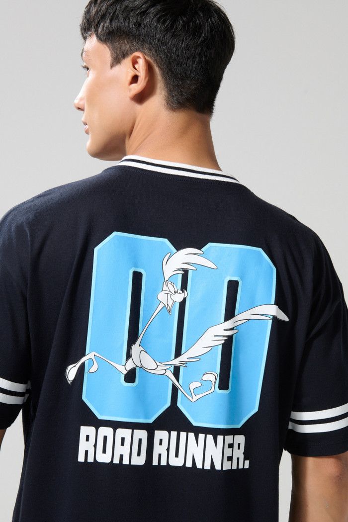 Camiseta cuello V azul oversize con arte de Looney Tunes