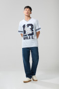 Camiseta cuello V oversize azul con arte de Looney Tunes