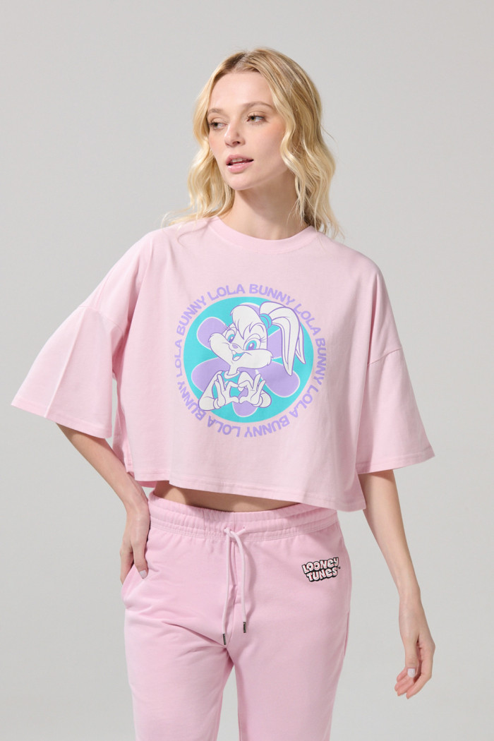 Camiseta rosada clara crop top oversize de Looney Tunes
