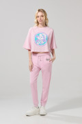 Camiseta rosada clara crop top oversize de Looney Tunes