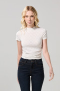 Camiseta unicolor con texturas, cuello alto y manga corta