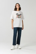 Camiseta crema clara oversize cuello redondo de Snoopy