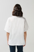 Camiseta crema clara oversize cuello redondo de Snoopy