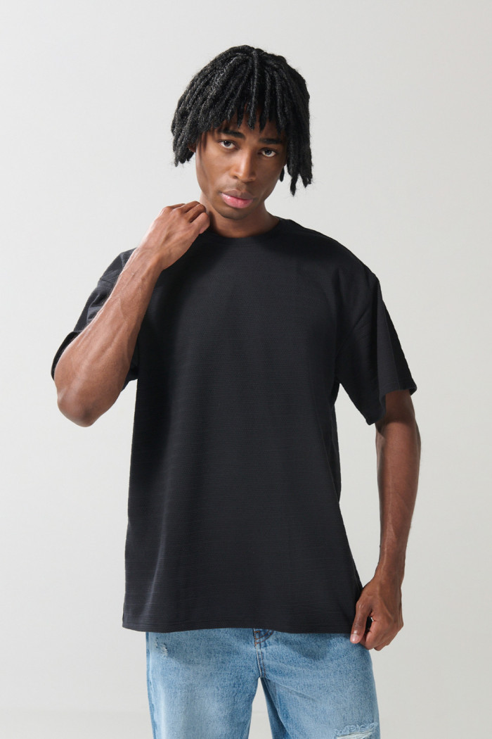 Camiseta unicolor manga corta oversize con texturas