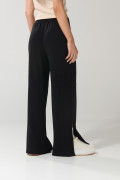 Pantalón palazzo negro tiro alto bota recta con abertura