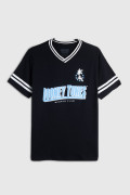 Camiseta cuello V azul intensa oversize de Looney Tunes