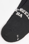 Medias tobilleras negras con texto college en frente