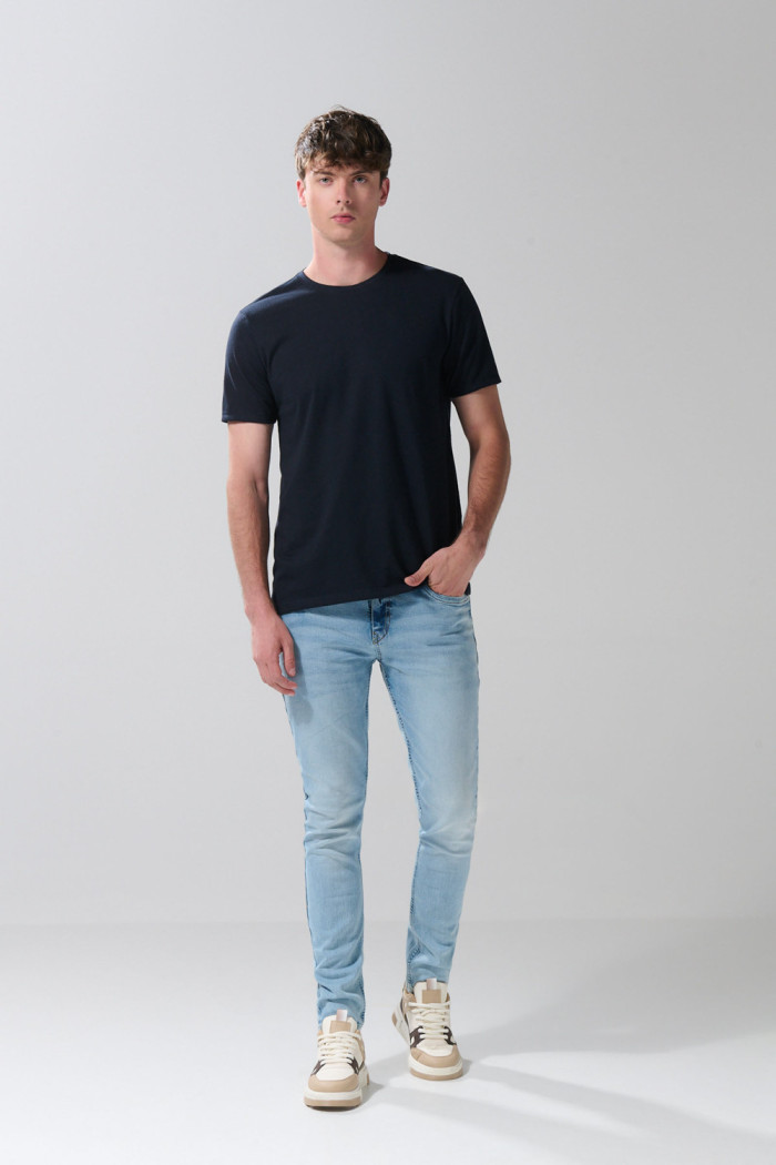 Jean skinny tiro bajo azul claro ajustado con desgastes