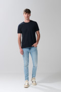 Jean skinny tiro bajo azul claro ajustado con desgastes