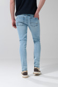 Jean skinny tiro bajo azul claro ajustado con desgastes