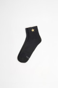 Medias unicolores cortas con diseño de estrella