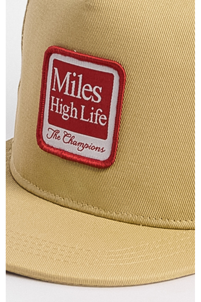 Gorra kaki con parche bordado de "miles hidh life of - the champions"