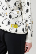 Buzo de Snoopy crema oversize con cuello redondo