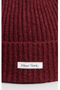 Gorro unicolor tejido con marquilla en frente