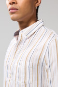 Camisa unicolor con diseños de rayas y manga larga