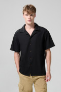 Camisa unicolor con texturas y manga corta