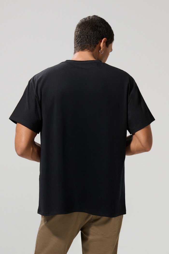 Camiseta cuello redondo negra con arte de Green Day
