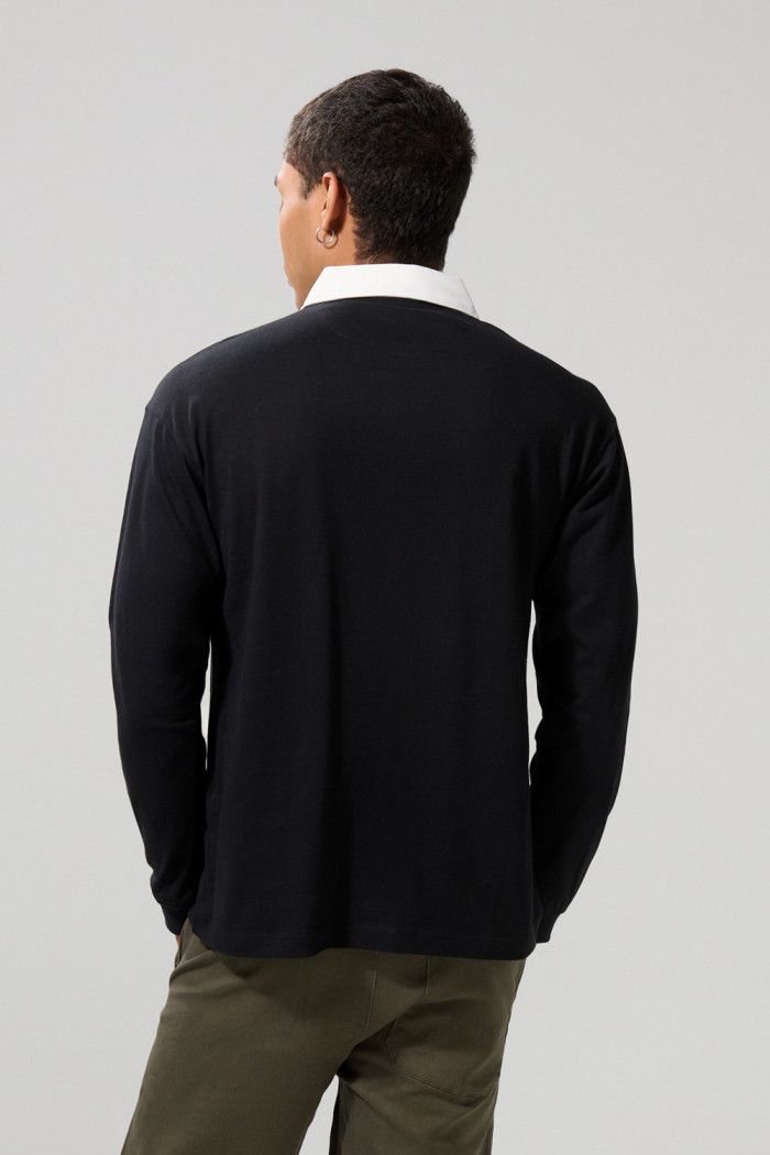 Camiseta polo unicolor manga larga con cuello en contraste