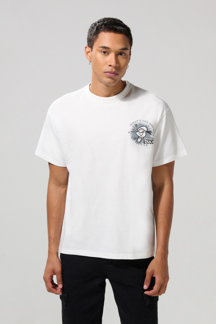 Camiseta crema manga corta oversize con diseños de Donald