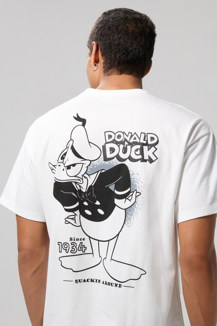 Camiseta crema manga corta oversize con diseños de Donald