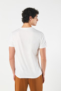 Camiseta unicolor ajustada con cuello redondo en algodón
