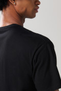 Camiseta unicolor en algodón con cuello redondo