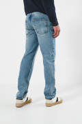 Jean 90´S tiro bajo azul claro con desgastes y cremallera