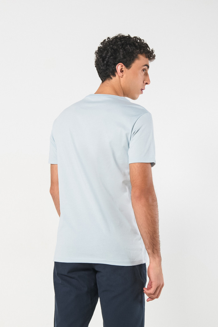 Camiseta azul de Félix el gato con bolsillo y manga corta